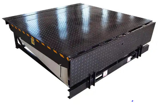 Aanpasbare dekhoogte Elektrische dokdeur levelers Workshop Automatische dokplaat 25000-40000LBS Veilig ontwerp