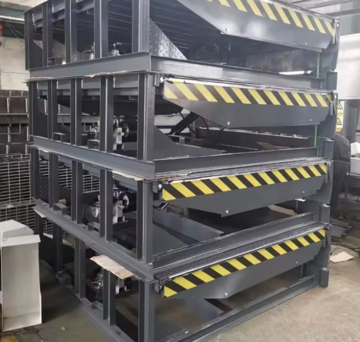 Op maat gemaakte ladingdock leveler met elektrische energiebron 10 capaciteit magazijn staal draagbare hydraulische mobiele